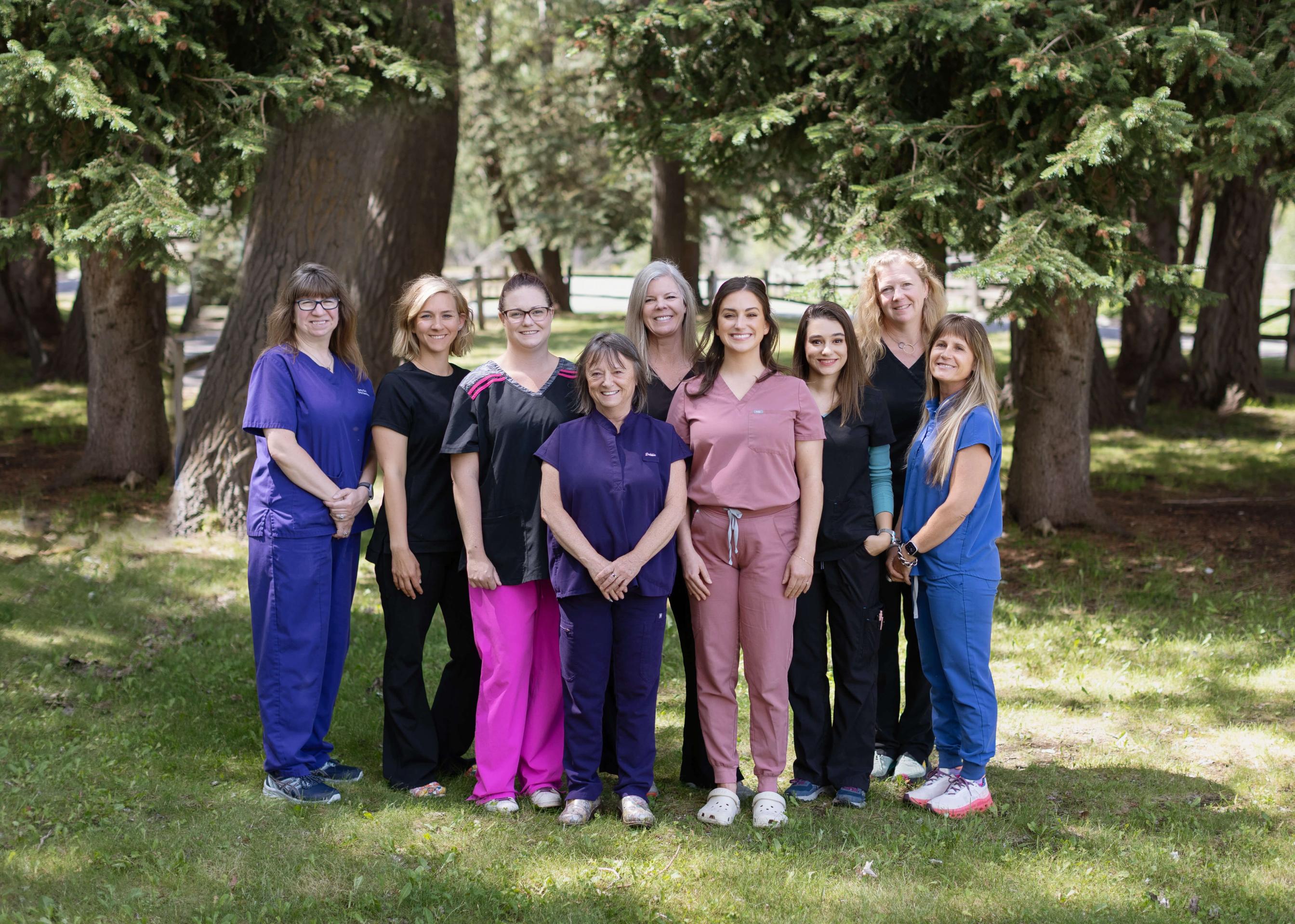 2025 Alpine Animal Hospital Team team of veterinary professionals standing outside in a group.